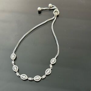 Silver sparkling bracelet with bolo closure
